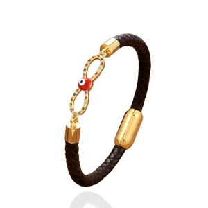 Braided black leather bracelet with golden infinity evil eye charm and magnetic clasp