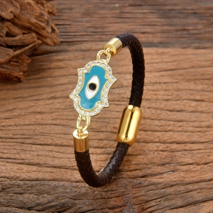 Bracelet tressé en cuir avec breloque Main de Fatma et mauvais œil doré chic