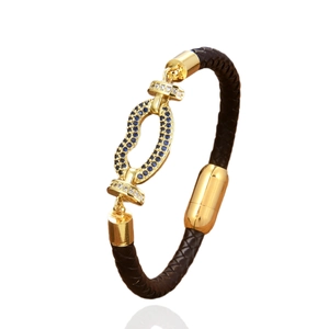 Braided leather bracelet with gold infinity charm, blue gems and magnetic clasp