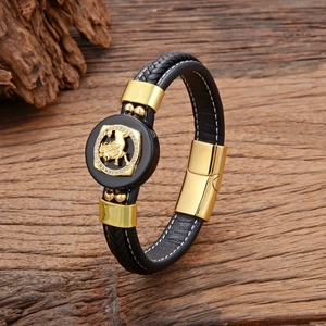 Bracelet pour homme en cuir tressé noir avec emblème de lion doré et accents cristallins