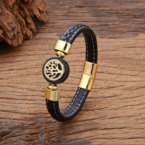 Bracelet tressé en cuir noir avec charme arbre de vie doré et fermoir magnétique