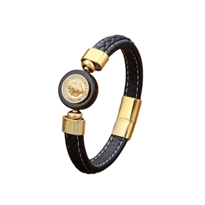 Bracelet pour homme en cuir tressé noir avec tête de lion dorée et zircons brillants