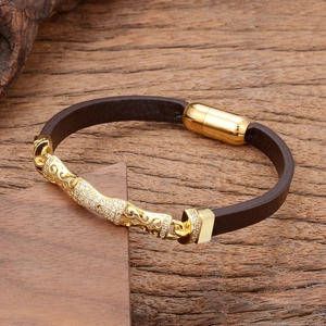 Bohemian brown leather bracelet with gold-plated metal inlay and zircon accents