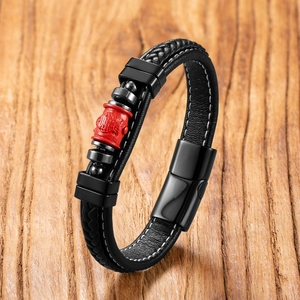 Woven black leather bracelet with red cinnabar lotus bead and magnetic clasp for men