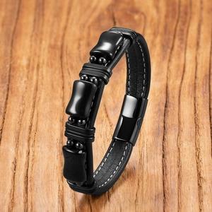 Men's black leather bracelet with magnetic metal clasp and stone bamboo design