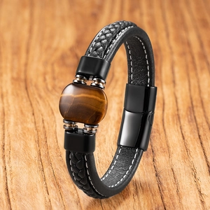Classic braided leather bracelet for men featuring a tiger eye stone and magnetic clasp