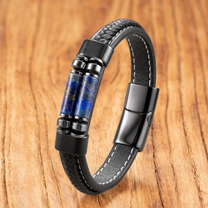 Detail of men's leather bracelet with blue natural stones and black magnetic clasp