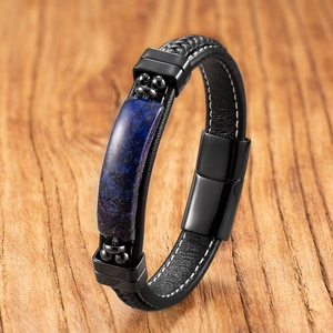 Detailed view of men's black braided leather bracelet with blue natural stone and magnetic clasp