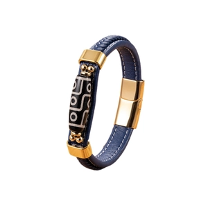 Blue leather woven bracelet with Tibetan bead and polished gold magnetic clasp
