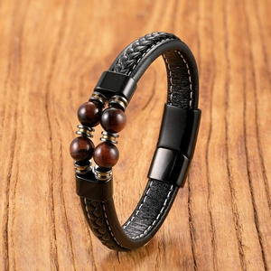 Men's handmade black leather bracelet with red tiger eye stones and magnetic clasp