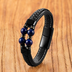 Close-up of men's leather bracelet with blue tiger eye beads and matte black magnetic clasp