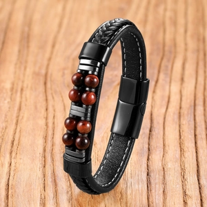 Vintage Herrenarmband aus schwarzem geflochtenem Leder mit Natur-Tigerauge und Metallverschluss