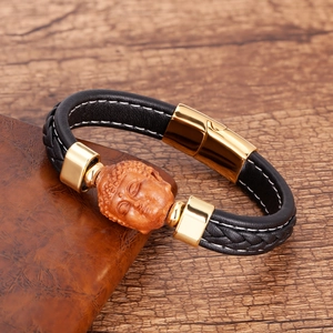 Vintage Herrenarmband aus geflochtenem Leder mit geschnitztem Buddhakopf und Goldverschluss