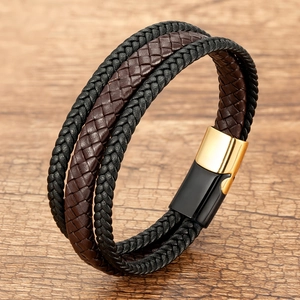 Close-up of multi-layer braided leather bracelet with magnetic stainless steel clasp