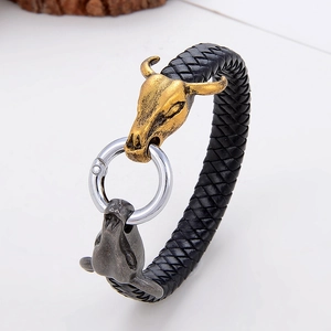 Rugged men's woven leather bracelet featuring retro gold and silver bull head metal clasp