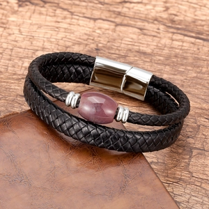 Close-up of double-layer woven leather bracelet with purple stone and magnetic clasp