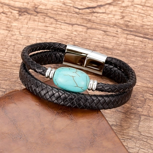 Braided black leather bracelet with turquoise stone inlay and silver magnetic clasp