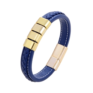 Navy blue woven leather bracelet featuring gold square metal accents and a magnetic clasp