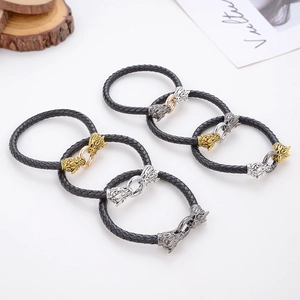 Bracciali vintage in pelle intrecciata con teste di drago e lupo in varie tonalità metalliche