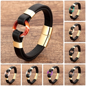 Detail view of woven leather bracelets with magnetic clasps in eight varied colors