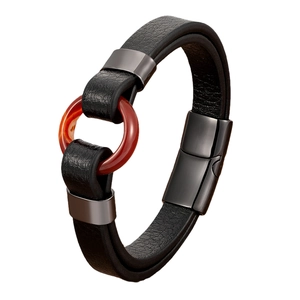 Mens braided black leather bracelet with reddish-brown bead and magnetic clasp