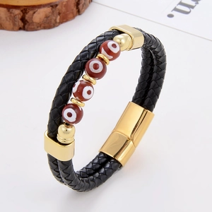 Bracelet en cuir tressé avec fermoir magnétique doré et perles rouges mauvais œil