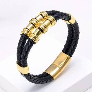 Men's vintage braided leather bracelet with gold magnetic clasp and metal ornaments