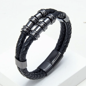 Men's double-layered black braided leather bracelet with gunmetal rings and magnetic clasp