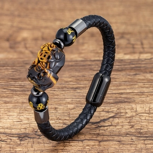 Ethnic woven leather bracelet with tiger eye stone Pi Yao and magnetic clasp