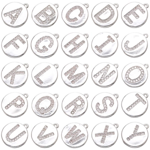 Close-up of sparkling A-Z letter charms with micro-pave crystals for DIY jewelry