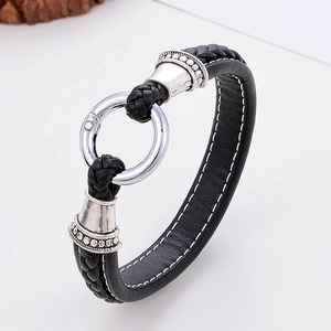 Bracciale classico in pelle nera intrecciata con chiusura magnetica rotonda in argento