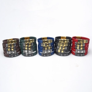 Classic braided leather bracelets with stainless steel clasps in five vibrant colors