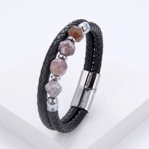 Detail of double-layer braided leather bracelet with natural stone beads and magnetic clasp