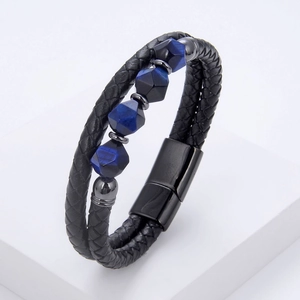 Detail of woven black leather cord bracelet with four blue natural stone beads and magnetic clasp