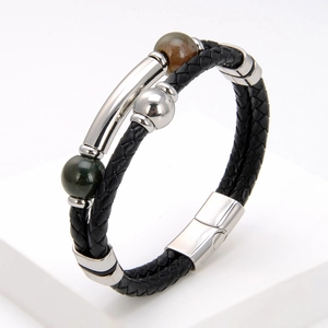 Detail of men's double-layer braided leather bracelet with magnetic stainless steel clasp