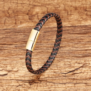 Men's retro braided leather bracelet with black and brown cords and golden magnetic clasp