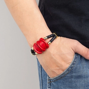 Braided black leather bracelet with red stone inserts and magnetic stainless steel clasp
