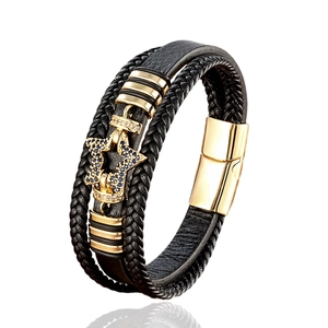 Multilayer black leather bracelet with golden star charm and magnetic clasp closure