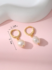 Detailed view of pearl earrings with 1.1cm hoop and 2.7cm total drop length