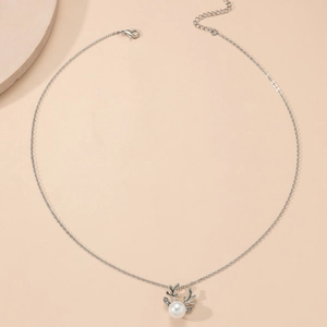 Minimalist silver elk necklace with pearl and rhinestones on a slim chain jewelry