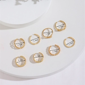 Set of 8 minimalist golden adjustable toe rings in varied geometric and rope designs