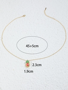 Detail showing pineapple pendant dimensions of 2.3cm by 1.9cm with 45cm plus 5cm chain