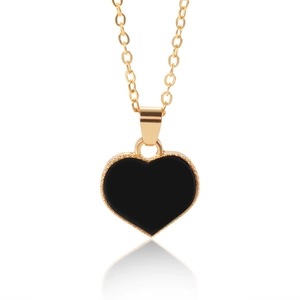 Minimalist gold chain necklace featuring a black heart pendant with beaded edge detail