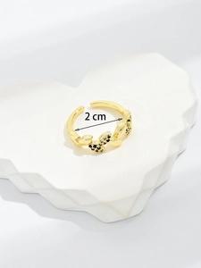 Detailed close-up showing 2 cm inner diameter of golden butterfly ring with colorful zircons