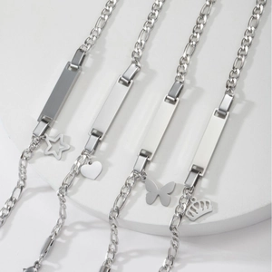 Polished stainless steel Figaro ID bracelet with butterfly, heart, and star charms