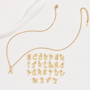 Minimalist gold bamboo style initial necklace set with 26 English letter pendants