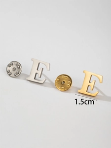 Detail view of 1.5cm letter E brooches in gold and silver finish with butterfly clutch