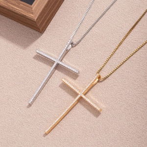 Minimalist cross pendant necklaces in gold and silver finish with pavé zircon stones