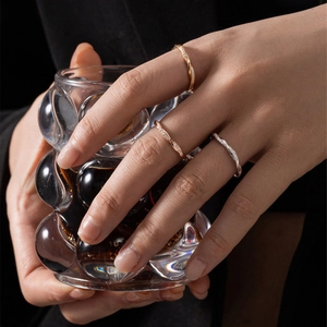 Minimalist twisted pave ring set in gold, rose gold and silver finish for women