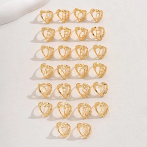 26-piece set of gold hollow letter rings with heart frames and floral vine details